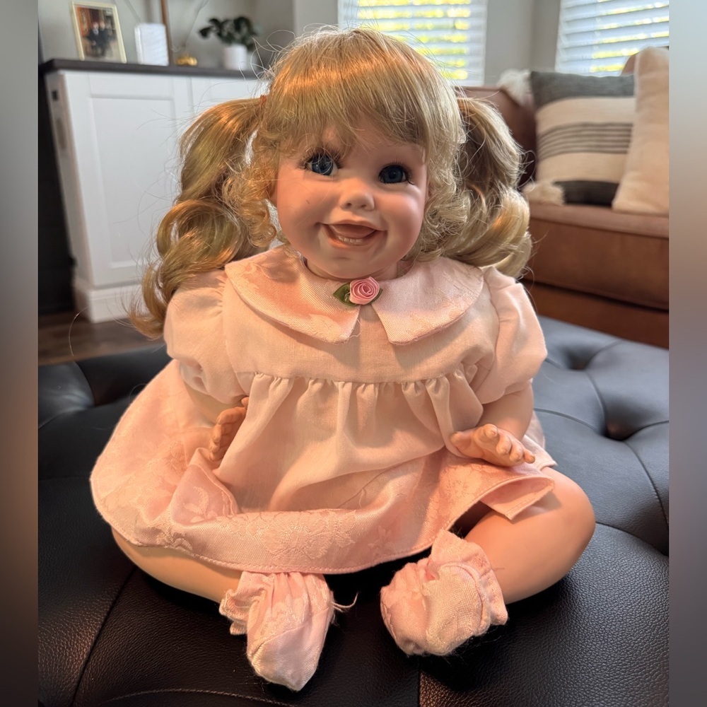Adorable Pink Porcelain Doll with Pigtails